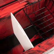 Inside of the 75 quart Red and Black RECTEQ ICER cooler with the cutting board/divider and hanging basket.