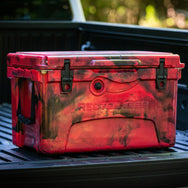 45qt. Red and Black RECTEQ ICER cooler closed and on a truck tailgate.